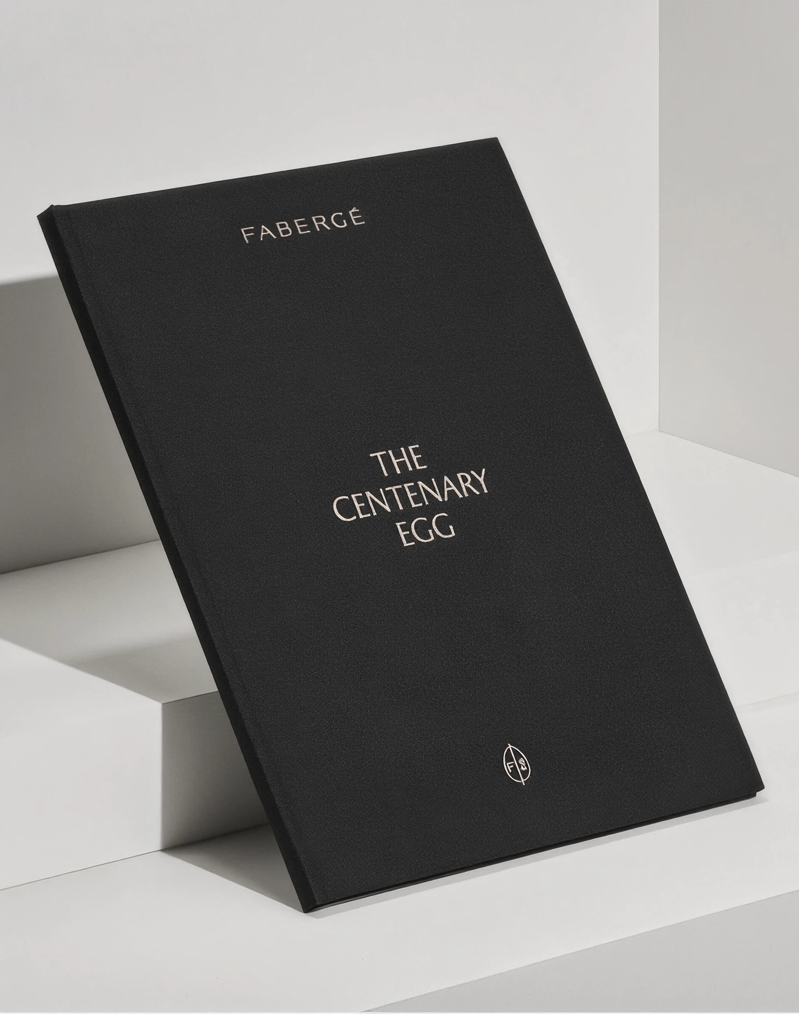 A black softcover book reading THE PATH YOU SEEK stands propped on a white plinth.