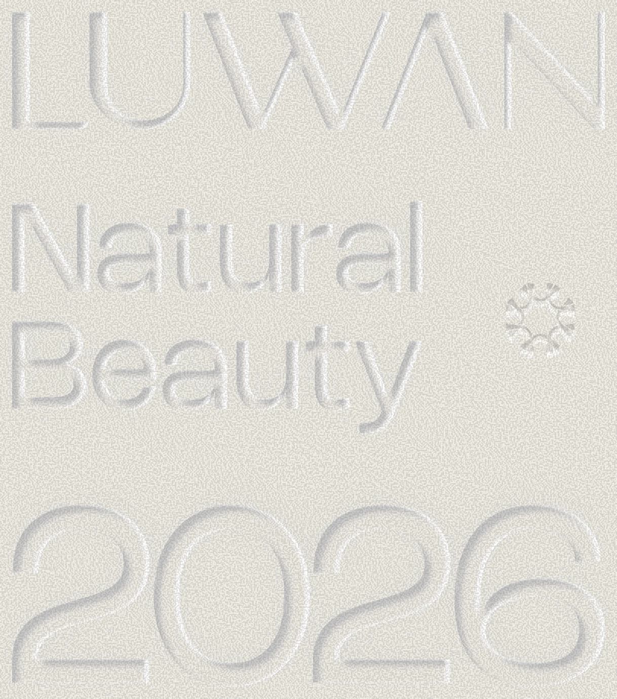 LUWAN embossed wordmark — Natural Beauty 2026