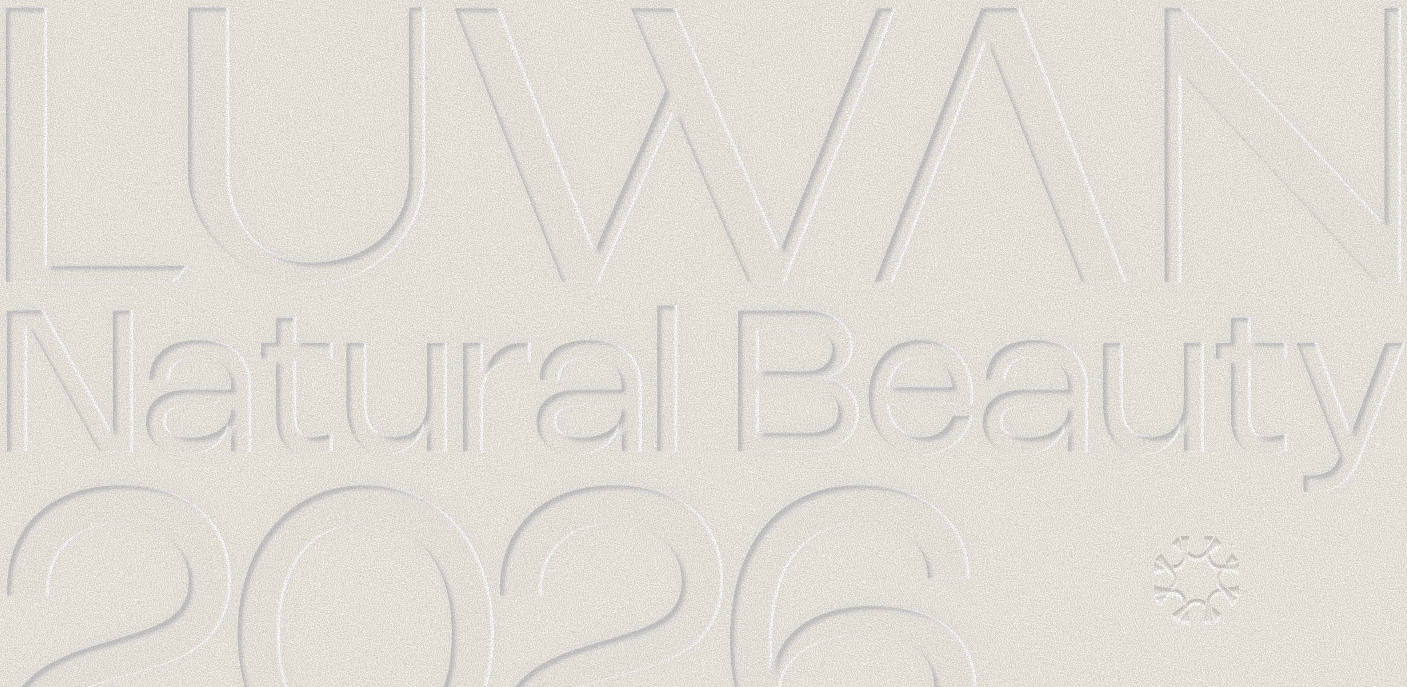 LUWAN embossed wordmark — Natural Beauty 2026