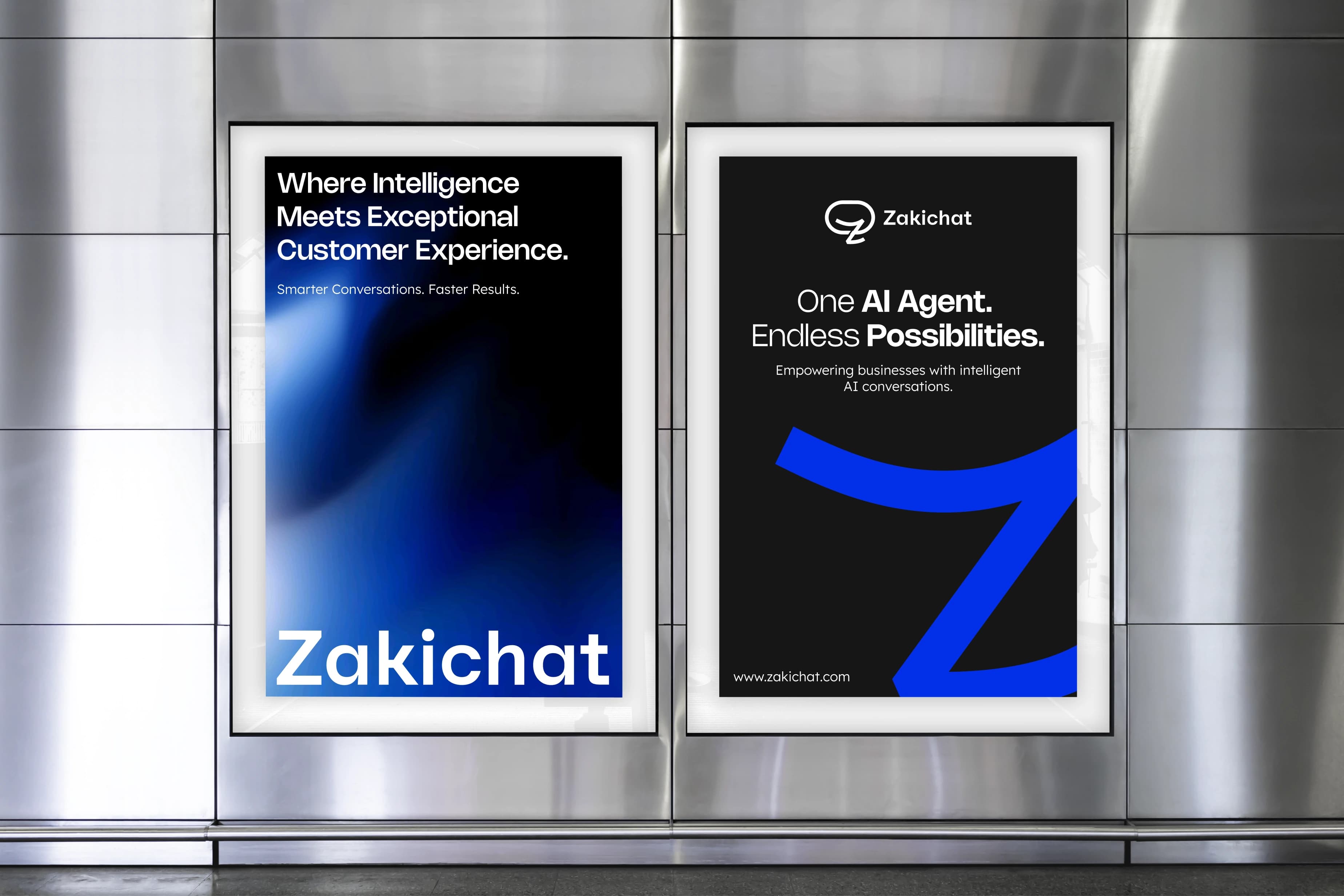 Zakichat — backlit wall posters Two backlit posters mounted side by side on a brushed-metal panelled interior wall, the left one blooming from black into a blue gradient behind a large white Zakichat wordmark and the right one near-black with a small lockup and an oversized electric-blue Z.